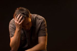 depressed man needs the relief from treatment with IV ketamine + neuroplasticity