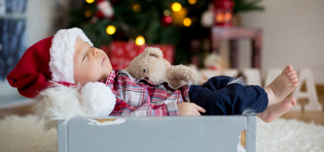 This baby sleeping in a box at Christmas is peaceful. But holidays with depressed family can be hard on everyone.