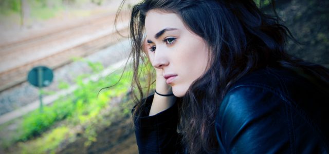 Can genetic clues really predict bipolar disorder in people like this young woman, who doesn't understand her disorder.