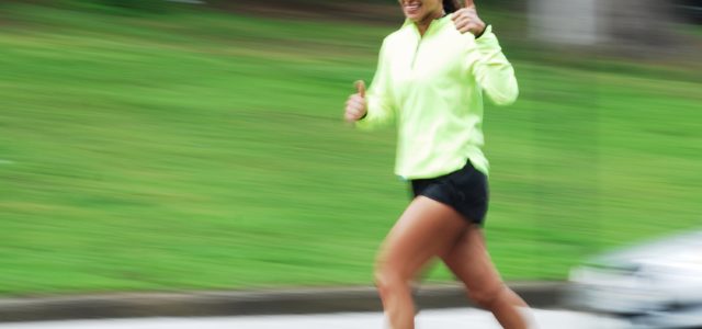 This lady is jogging and knows that exercise reduces future depression.